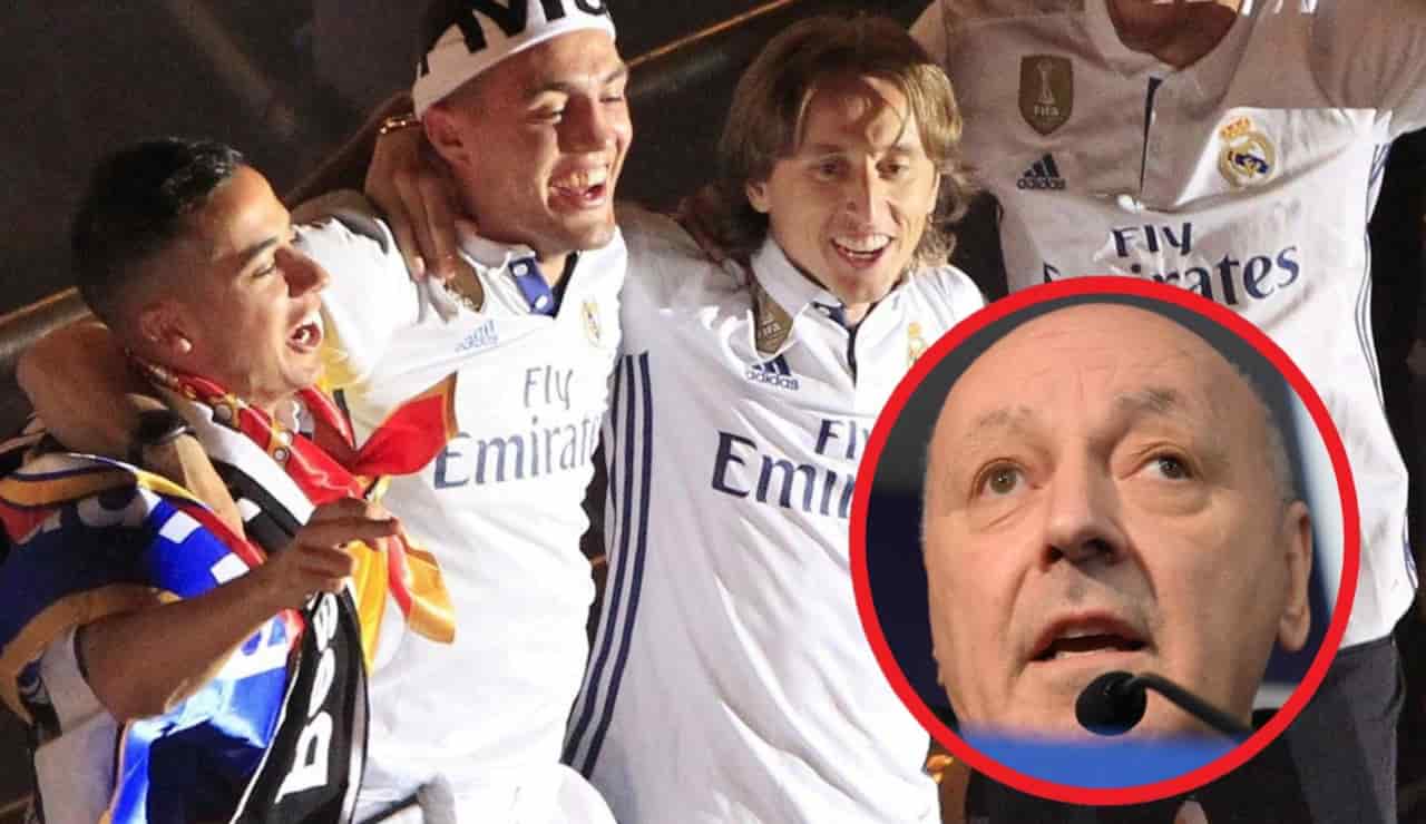 Il Real Madrid che festeggia e Beppe Marotta - Foto ANSA - Dotsport.it